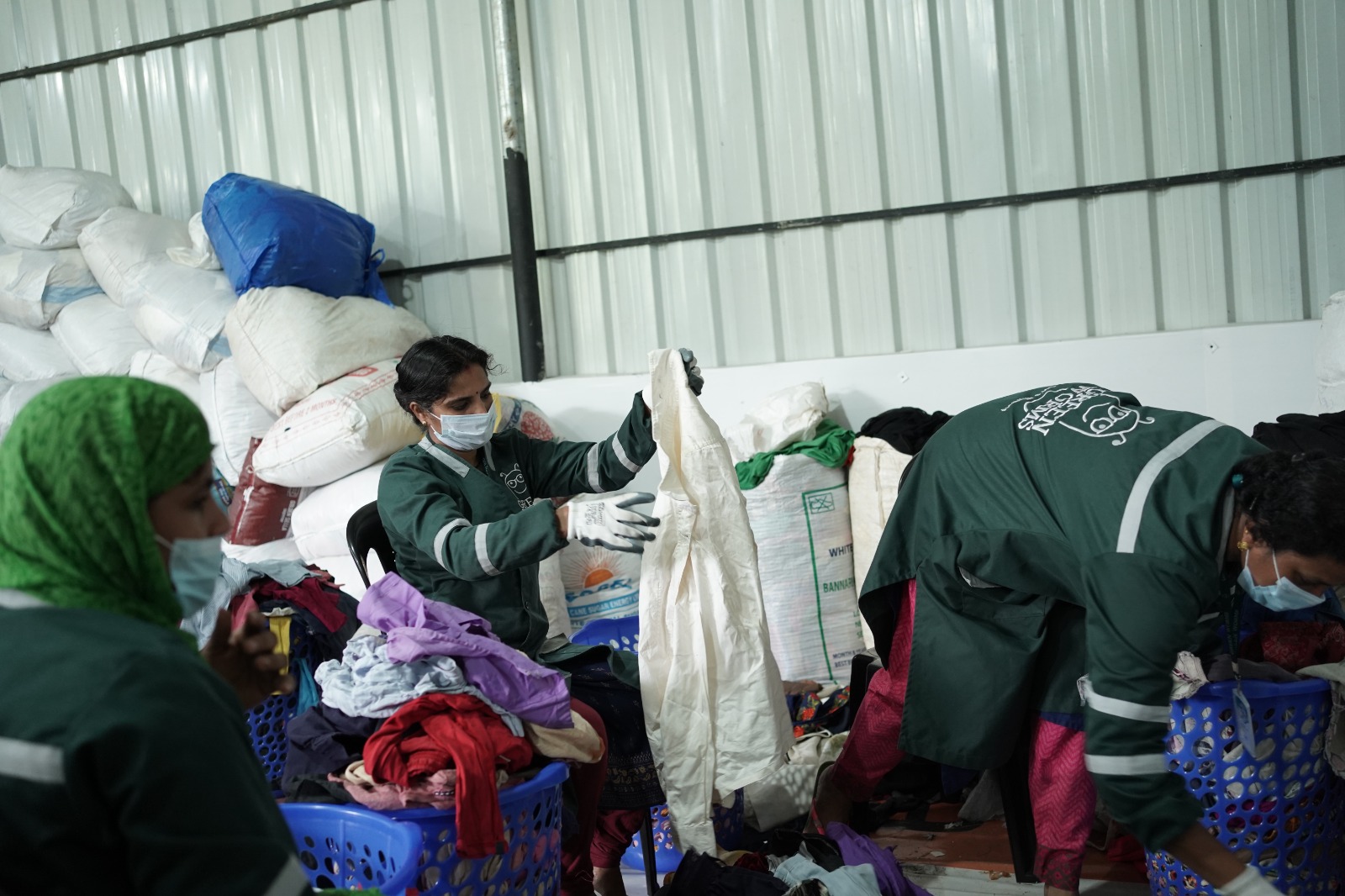 Textiles Neutrality Program - Workers sorting textile waste